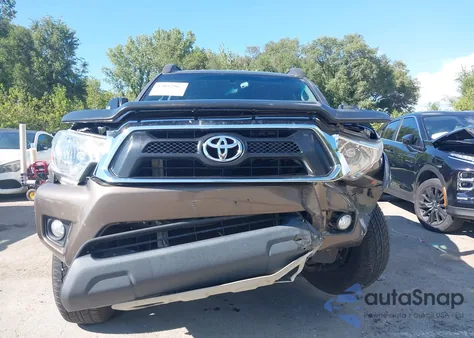 2014 Toyota Tacoma Base V6 z USA, uszkodzony, nr VIN 3TMLU4EN0EM144133